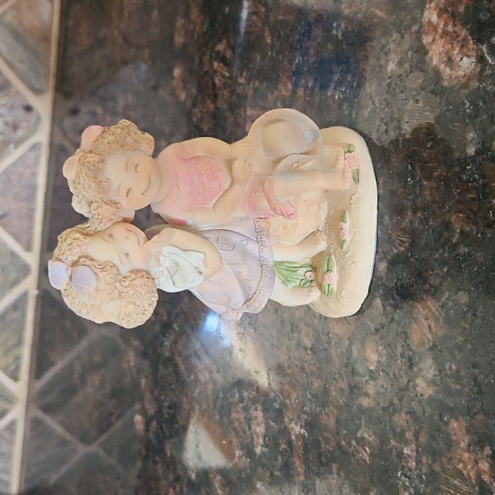 Polystone kids figurine